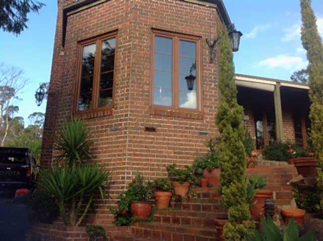 Golden Oak coloured french windows garden viewed