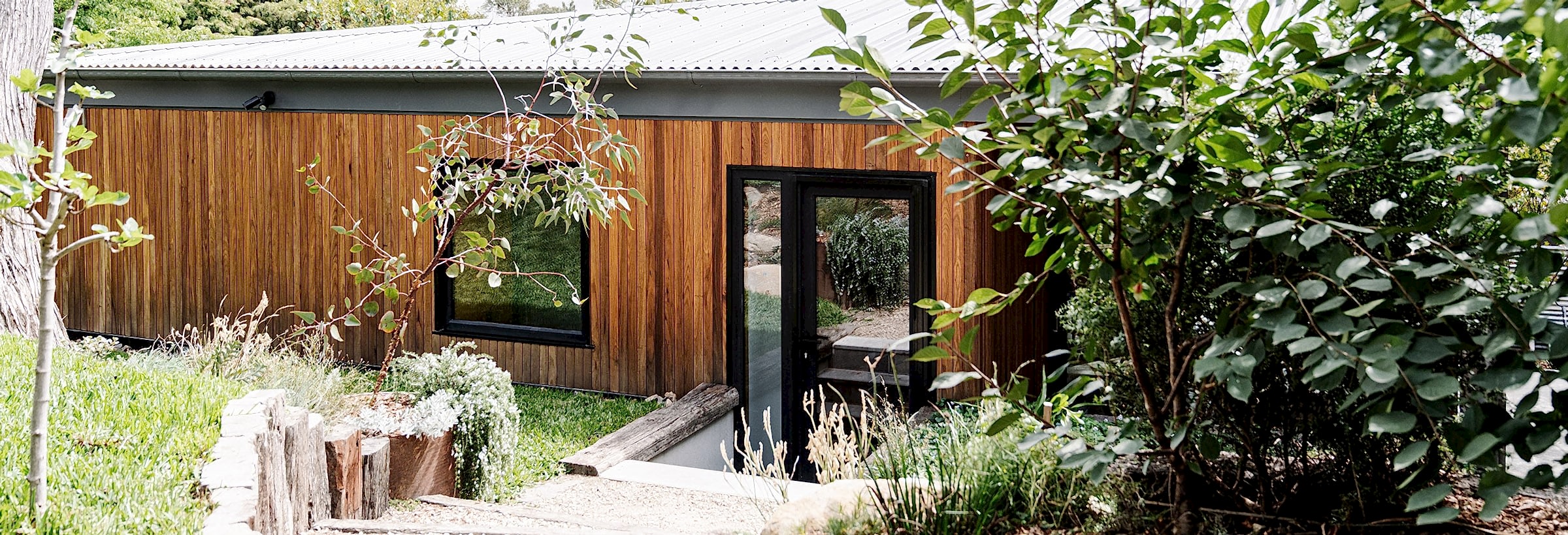 Beautiful Black Entry Door of a passive house in Yarra St